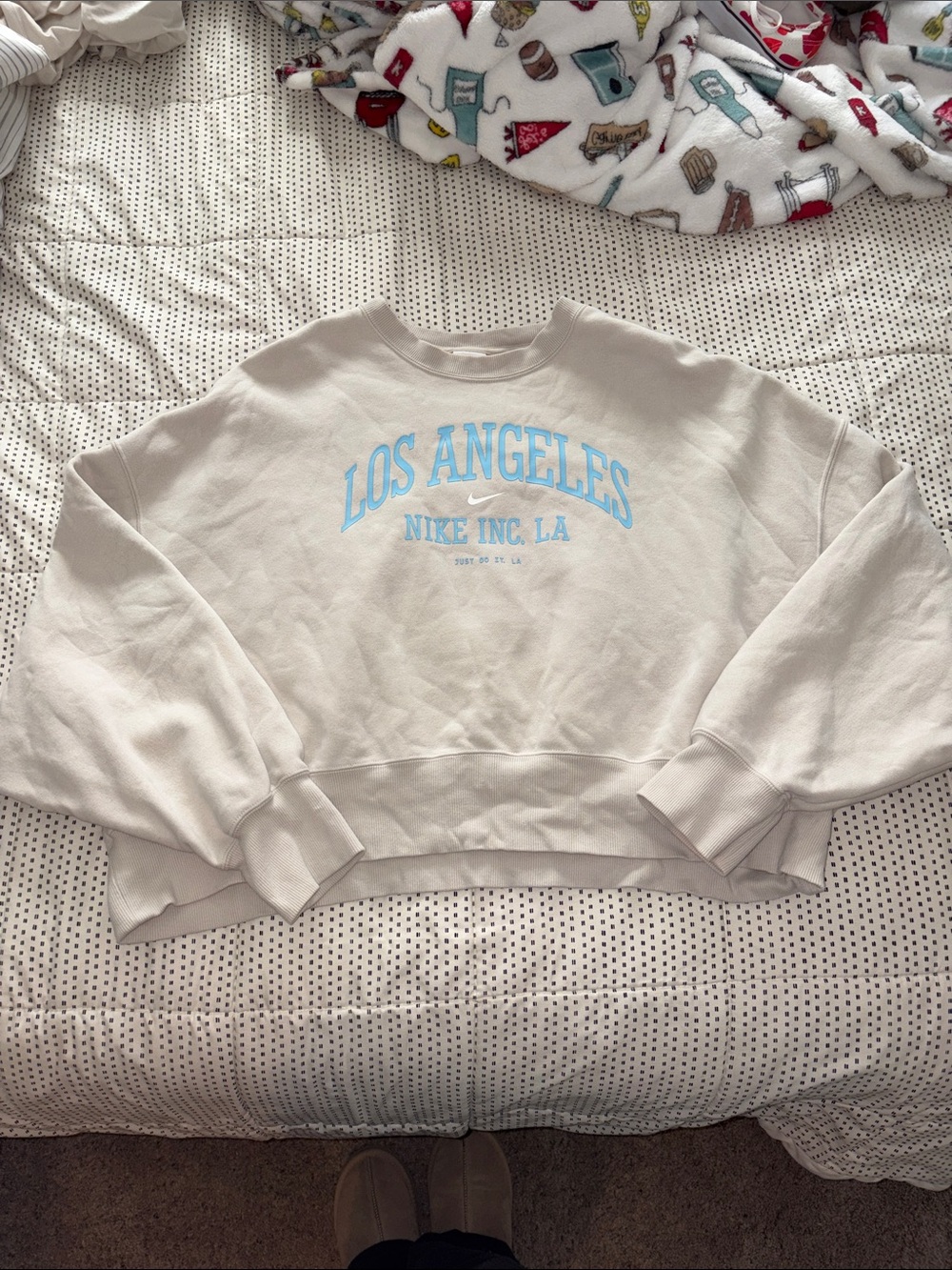Nike Women's Cream Crewneck Sweatshirt with Light Blue "Los Angeles" Logo